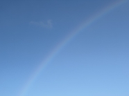 蓝色天空彩虹背景摄影图片