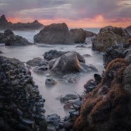 黄昏海岸礁石风景图片