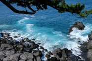 蓝色大海岩石海岸风光摄影图片