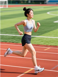 户外运动场跑道美女跑步运动图片