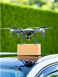 无人机投送包裹摄影图片
