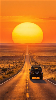 广阔荒原笔直公路越野车黄昏摄影图片